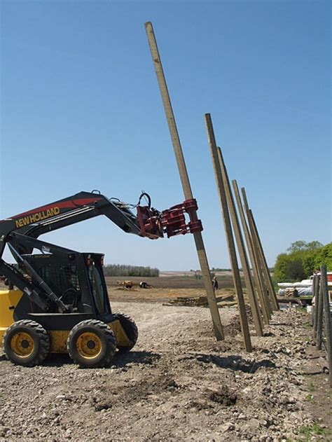 skid steer for pole set|pole setters for sale.